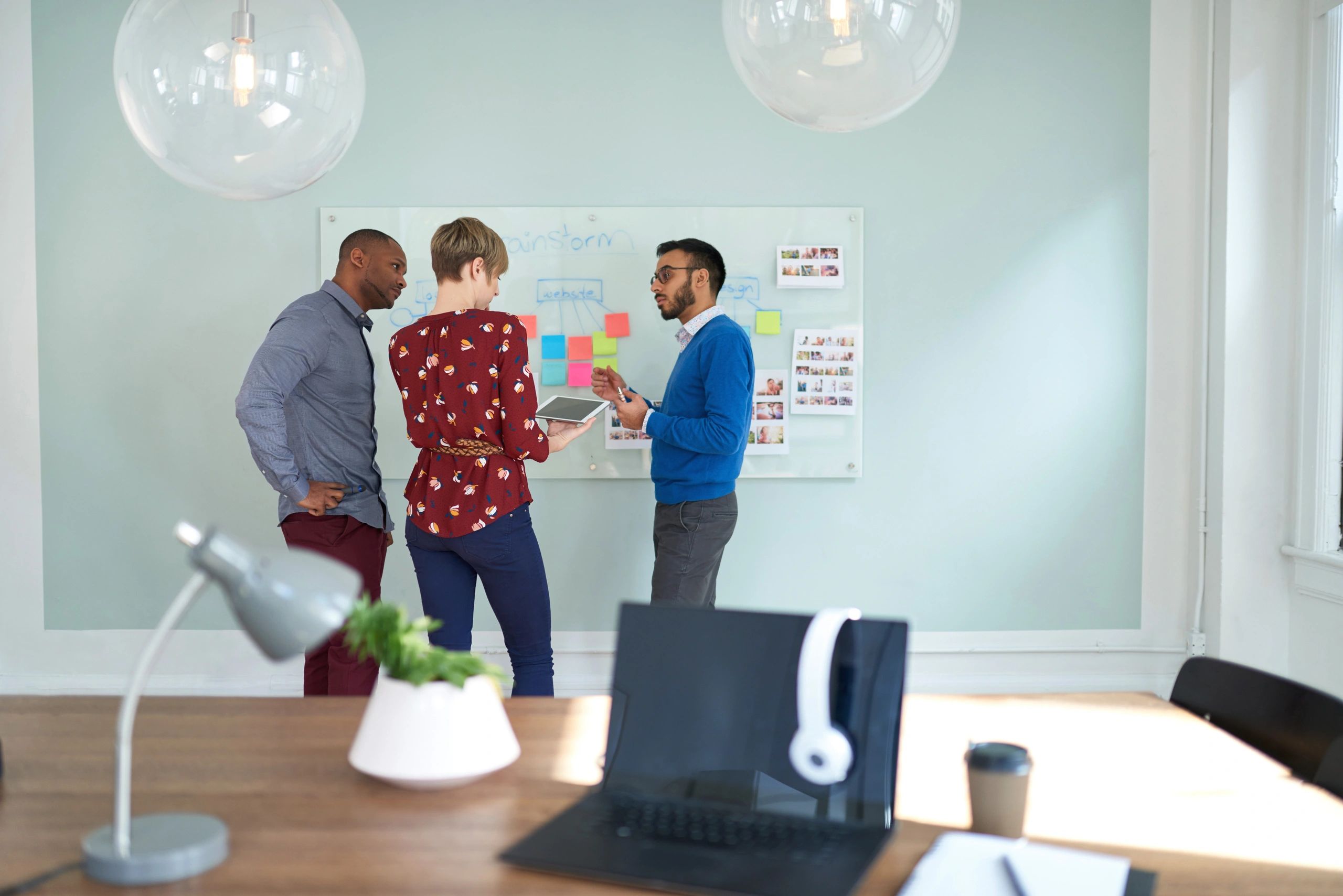 Recruitment team collaborating in a modern office