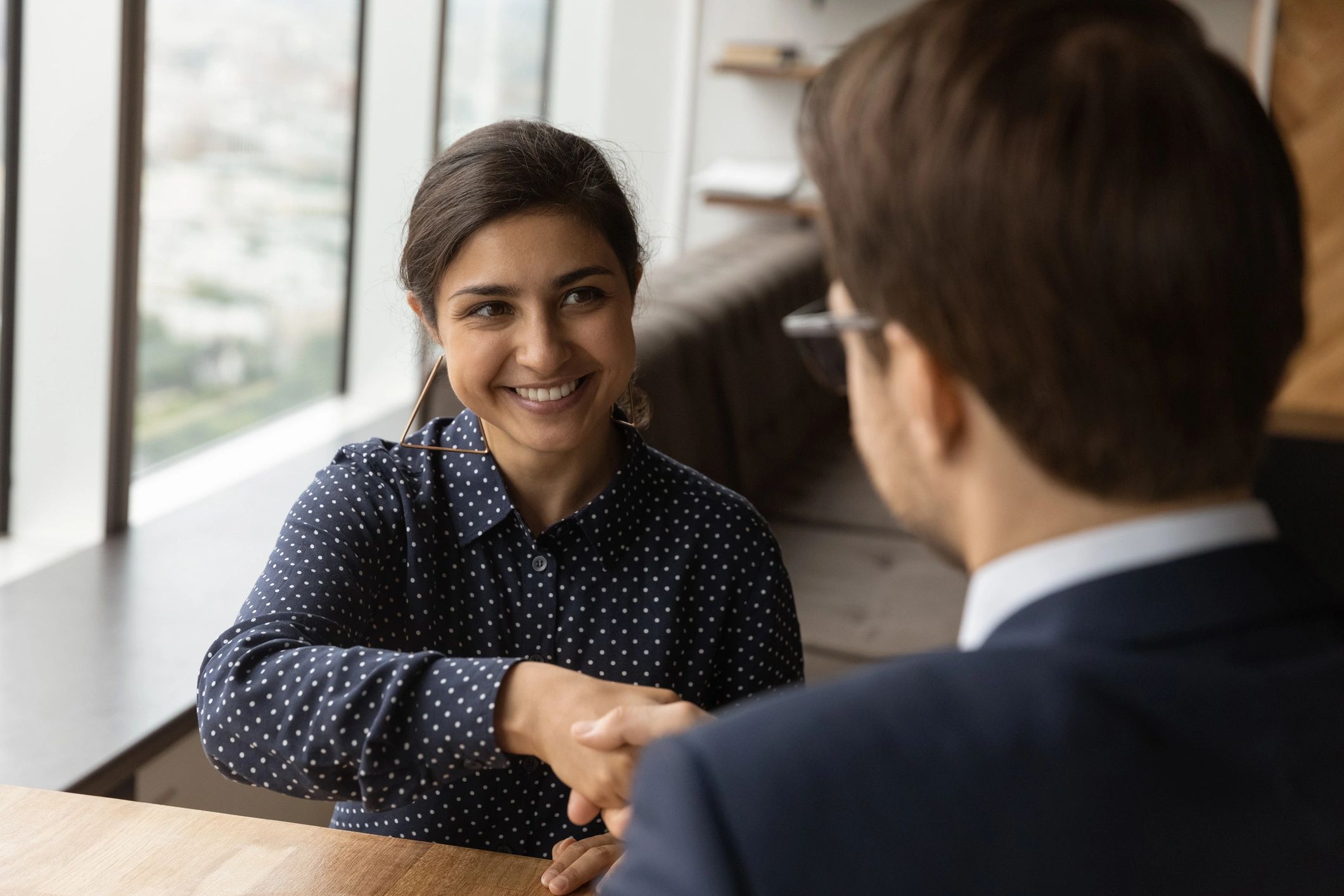 Professional headshot-style image representing a hiring manager testimonial