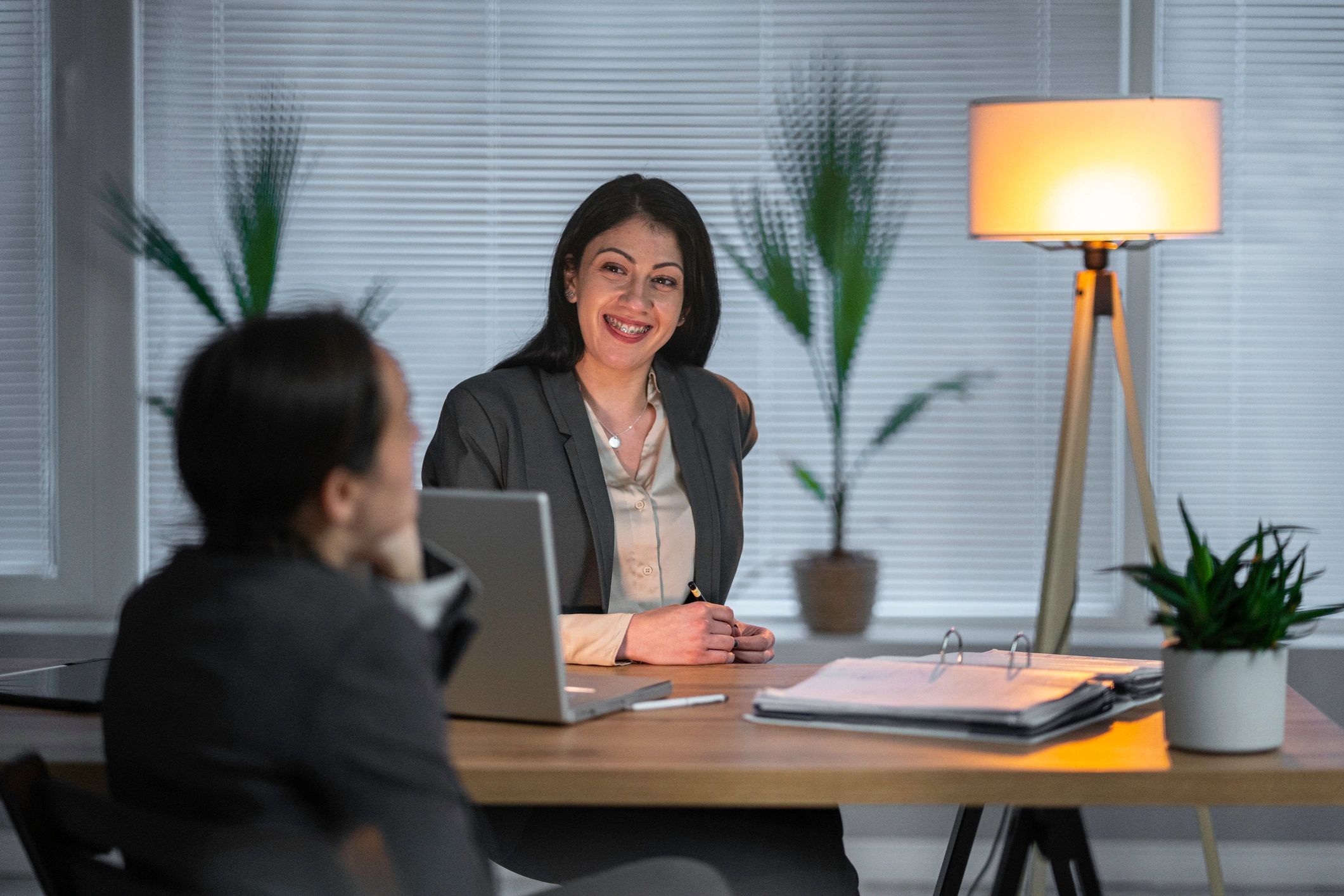 Recruiter interviewing a candidate in an office